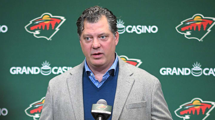Dec 13, 2025; Saint Paul, Minnesota, USA;  Minnesota Wild general manger Bill Guerin addresses the media about acquiring defensemen Quinn Hughes via trade from the Vancouver Canucks before a game against the Ottawa Senators at Grand Casino Arena. Mandatory Credit: Nick Wosika-Imagn Images