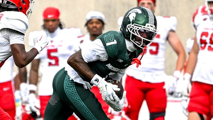 Michigan State's Omari Kelly, right, runs after a catch as Youngstown State's Brandon Chambers Jr. closes in during the second quarter on Saturday, Sept. 13, 2025, at Spartan Stadium in East Lansing.