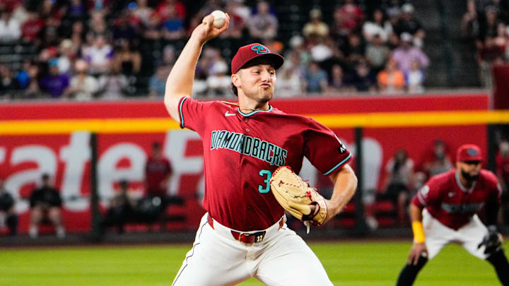 Apr 5, 2026; Phoenix, Arizona, USA; Arizona Diamondbacks pitcher Brandon Pfaadt (32) pitches during the first inning at Chase Field against the Atlanta Braves. Mandatory Credit: Arianna Grainey-Imagn Images