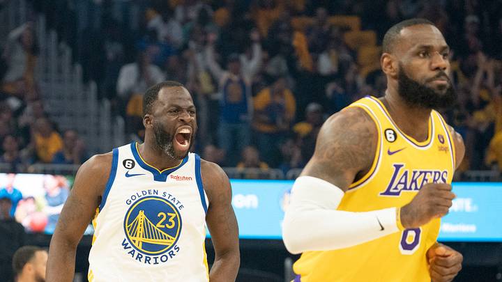 Golden State Warriors forward Draymond Green (23) celebrates against Los Angeles Lakers forward LeBron James (6) Golden State Warriors forward Draymond Green (23) celebrates against Los Angeles Lakers forward LeBron James (6)