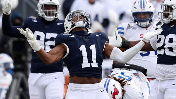 Dec 21, 2024; University Park, Pennsylvania, USA; Penn State Nittany Lions defensive end Abdul Carter (11) reacts after sacking Southern Methodist Mustangs quarterback Kevin Jennings (7) during the third quarter in the first round of the College Football Playoff at Beaver Stadium. Mandatory Credit: Matthew O'Haren-Imagn Images Dec 21, 2024; University Park, Pennsylvania, USA; Penn State Nittany Lions defensive end Abdul Carter (11) reacts after sacking Southern Methodist Mustangs quarterback Kevin Jennings (7) during the third quarter in the first round of the College Football Playoff at Beaver Stadium. Mandatory Credit: Matthew O'Haren-Imagn Images