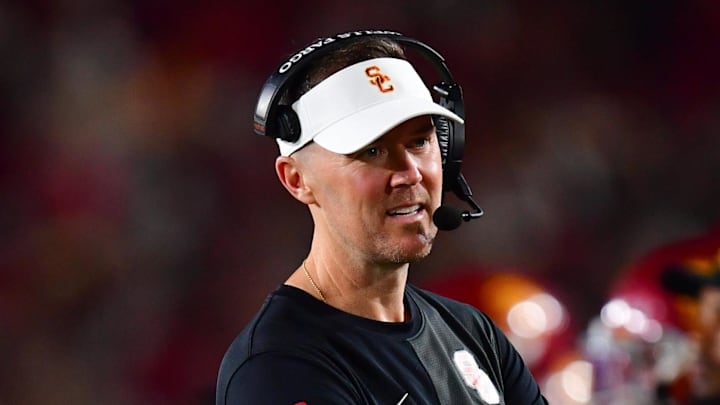 Sep 20, 2025; Los Angeles, California, USA; Southern California Trojans head coach Lincoln Riley speaks with the official during the second half at the Los Angeles Memorial Coliseum. Mandatory Credit: Gary A. Vasquez-Imagn Images