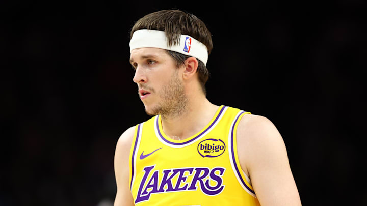 Dec 23, 2025; Phoenix, Arizona, USA; Los Angeles Lakers guard Austin Reaves (15) against the Phoenix Suns at Mortgage Matchup Center. Mandatory Credit: Mark J. Rebilas-Imagn Images