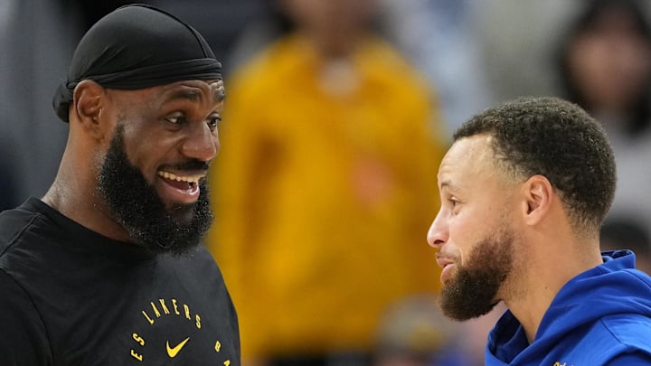 Dec 25, 2024; San Francisco, California, USA; Los Angeles Lakers forward LeBron James (left) and Golden State Warriors guard Stephen Curry (right) talk before the game at Chase Center. Mandatory Credit: Darren Yamashita-Imagn Images