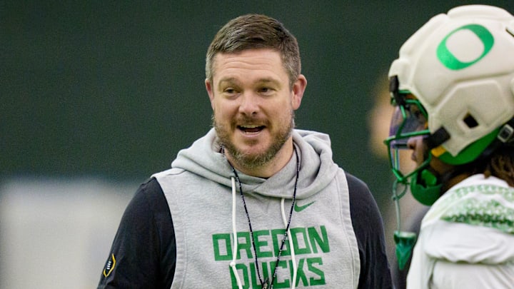 Oregon head coach Dan Lanning walks the field during an open practice ahead of the Orange Bowl at the Moshofsky Center in Eugene, Oregon on Dec. 27, 2025.