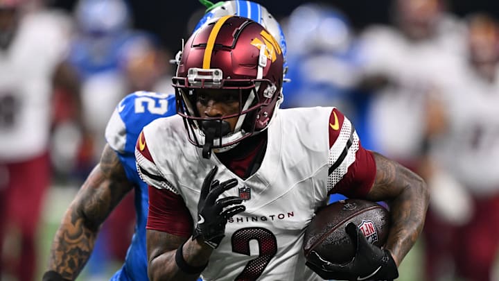 Jan 18, 2025; Detroit, Michigan, USA; Washington Commanders wide receiver Dyami Brown (2) runs the ball during the first quarter against Detroit Lions in a 2025 NFC divisional round game at Ford Field. Mandatory Credit: Lon Horwedel-Imagn Images