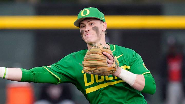 Oregon infielder Maddox Molony throws to first for an out as the Oregon Ducks host the Youngstown State Penguins on Feb. 19, 2026, at PK Park in Eugene, Oregon.