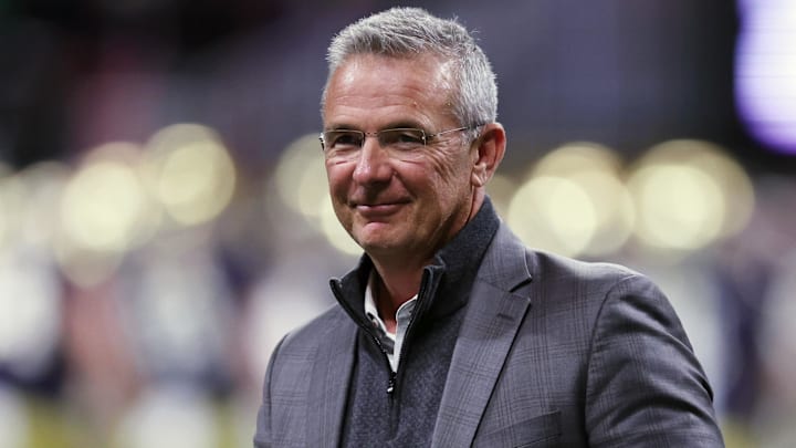 Jan 20, 2025; Atlanta, GA, USA; Urban Meyer looks on during the second half the CFP National Championship college football game at Mercedes-Benz Stadium. Mandatory Credit: Brett Davis-Imagn Images Jan 20, 2025; Atlanta, GA, USA; Urban Meyer looks on during the second half the CFP National Championship college football game at Mercedes-Benz Stadium. Mandatory Credit: Brett Davis-Imagn Images