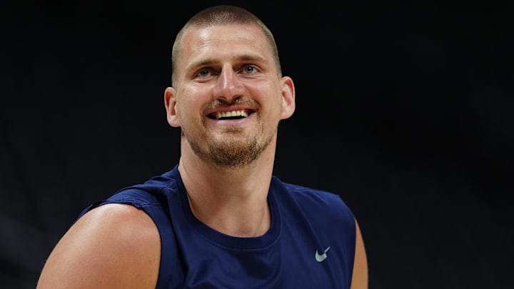 Apr 11, 2025; Denver, Colorado, USA; Denver Nuggets center Nikola Jokic (15) reacts before the game against the Memphis Grizzlies at Ball Arena. Mandatory Credit: Ron Chenoy-Imagn Images