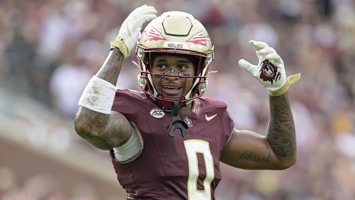 Aug 30, 2025; Tallahassee, Florida, USA; Florida State Seminoles defensive back Earl Little Jr. (0) reacts after a play against the Alabama Crimson Tide during the second half at Doak S. Campbell Stadium. Mandatory Credit: Melina Myers-Imagn Images