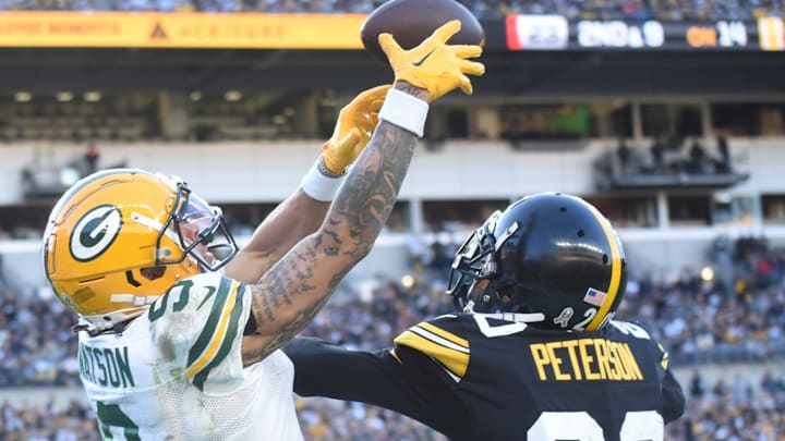 Christian Watson tries to make a catch over Patrick Peterson during the Packers-Steelers game in 2023. Christian Watson tries to make a catch over Patrick Peterson during the Packers-Steelers game in 2023.