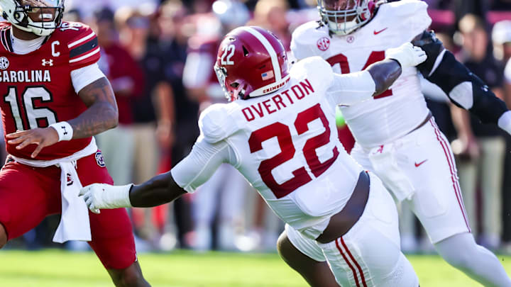 Oct 25, 2025; Columbia, South Carolina, USA; South Carolina Gamecocks quarterback Lanorris Sellers (16) throws under pressure from Alabama Crimson Tide defensive lineman Lt Overton (22) in the first quarter at Williams-Brice Stadium. Mandatory Credit: Jeff Blake-Imagn Images Oct 25, 2025; Columbia, South Carolina, USA; South Carolina Gamecocks quarterback Lanorris Sellers (16) throws under pressure from Alabama Crimson Tide defensive lineman Lt Overton (22) in the first quarter at Williams-Brice Stadium. Mandatory Credit: Jeff Blake-Imagn Images