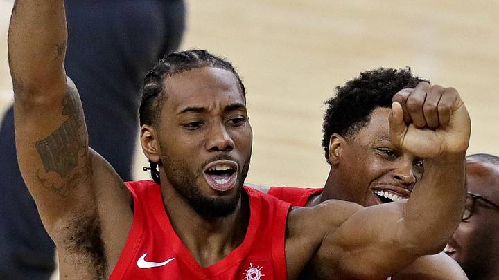 Kawhi Leonard and Toronto Raptors guard Kyle Lowry. Kawhi Leonard and Toronto Raptors guard Kyle Lowry.