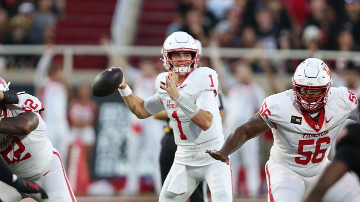 Sep 18, 2026; Lubbock, Texas, USA;  Houston Cougars quarterback Conner Weigman (1) passes against the Texas Tech Red Raiders in the first half at Galaxy Stadium.  Mandatory Credit: Michael C. Johnson-Imagn Images