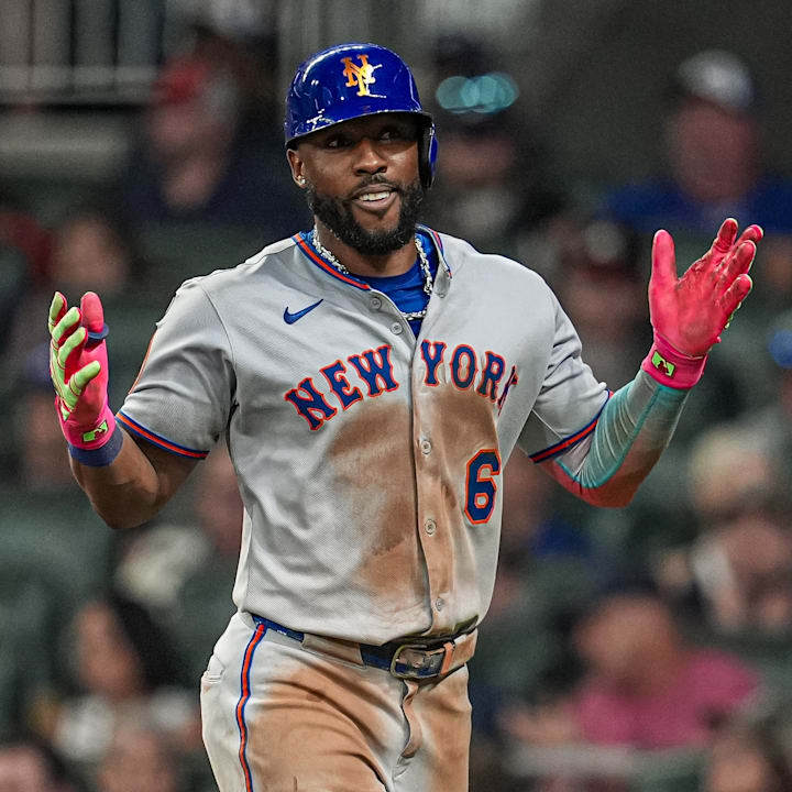 New York Mets left fielder Starling Marte (6) reacts after hitting a home run.
