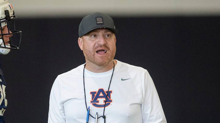 Auburn Tigers head coach Alex Golesh talks with his team during practice at Woltosz Football Performance Center in Auburn, Ala. on Thursday, April 16, 2026.