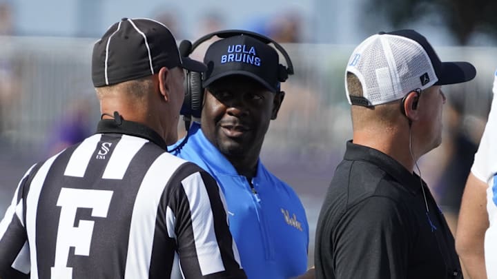 Sep 27, 2025; Evanston, Illinois, USA; UCLA Bruins interim head coach Tim Skipper talks to a official during the first half against the Northwestern Wildcats during the first half at Northwestern Medicine Field at Martin Stadium. Mandatory Credit: David Banks-Imagn Images