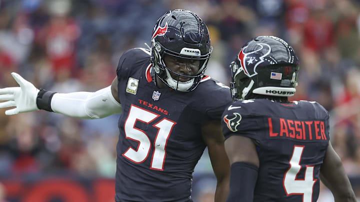 Nov 24, 2024; Houston, Texas, USA; Houston Texans defensive end Will Anderson Jr. (51) celebrate with cornerback Kamari Lassiter (4) after a tackle during the first quarter against the Tennessee Titans at NRG Stadium. Mandatory Credit: Troy Taormina-Imagn Images