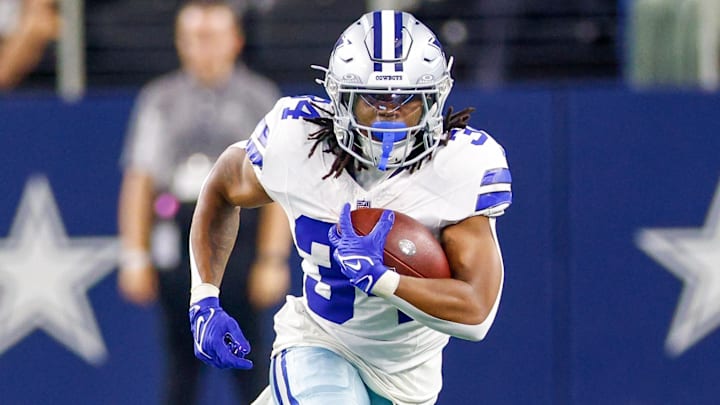 Aug 22, 2025; Arlington, Texas, USA; Dallas Cowboys running back Jaydon Blue (34) carries the ball during the fourth quarter against the Atlanta Falcons at AT&T Stadium. Mandatory Credit: Andrew Dieb-Imagn Images