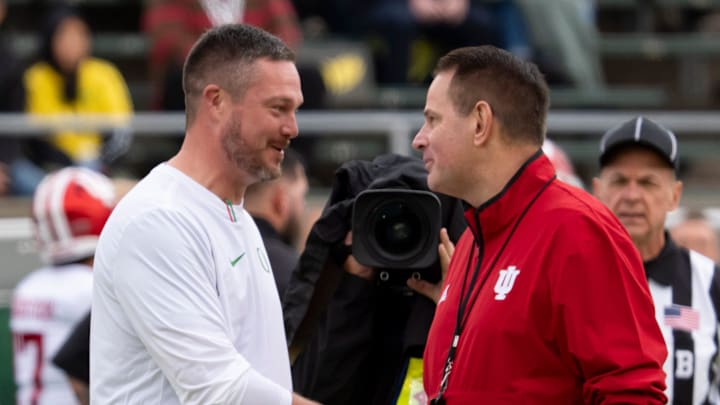 Oregon head coach Dan Lanning, left, shakes hands with Indiana head coach Curt Cignetti as the Oregon Ducks host the Indiana Hoosiers Oct. 11, 2025, at Autzen Stadium in Eugene, Oregon.