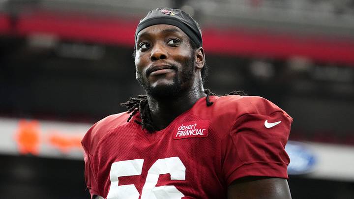 Arizona Cardinals defensive lineman Darius Robinson (56) looks off to the crowd during their training camp red and white practice at State Farm Stadium in Glendale on Aug. 9, 2026. Arizona Cardinals defensive lineman Darius Robinson (56) looks off to the crowd during their training camp red and white practice at State Farm Stadium in Glendale on Aug. 9, 2026.