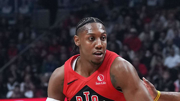 Toronto Raptors forward RJ Barrett controls the ball as Cleveland Cavaliers guard James Harden tries to defend. Toronto Raptors forward RJ Barrett controls the ball as Cleveland Cavaliers guard James Harden tries to defend.
