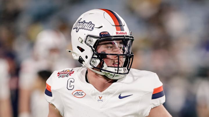Virginia Cavaliers quarterback Chandler Morris (4) warms up before the Gator Bowl against the Missouri Tigers 