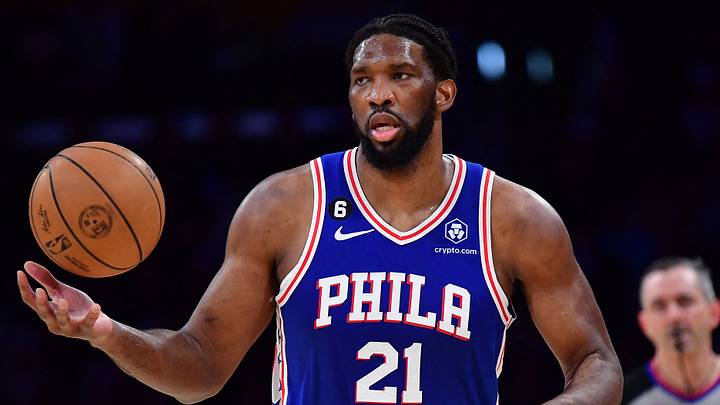 Philadelphia 76ers center Joel Embiid (21) brings the ball up court against the Los Angeles Lakers during the first half at Crypto.com Arena. 