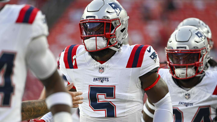Aug 25, 2024; Landover, Maryland, USA;  New England Patriots safety Jabrill Peppers (5) takes the field with teammates before the game against the Washington Commanders at Commanders Field. Mandatory Credit: Tommy Gilligan-Imagn Images