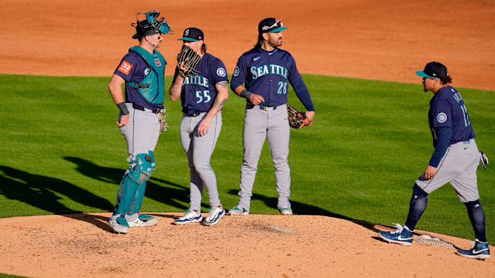 Seattle Mariners reliever number 55, Gabe Speier talks with his catcher Cal Raleigh after getting pulled in the sixth inning in game 5 of the American League Division Series at Comerica Park in Detroit on Wednesday, Oct. 8, 2025.