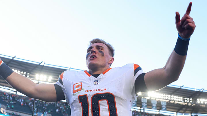 Oct 5, 2025; Philadelphia, Pennsylvania, USA; Denver Broncos quarterback Bo Nix (10) reacts as he walks off the field after a victory against the Philadelphia Eagles at Lincoln Financial Field. Mandatory Credit: Bill Streicher-Imagn Images