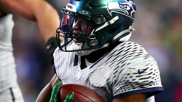 Dec 18, 2025; Seattle, Washington, USA; Seattle Seahawks running back Kenneth Walker III (9) runs against the Los Angeles Rams in the first half at Lumen Field. Mandatory Credit: Kevin Ng-Imagn Images