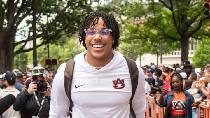 Auburn Tigers quarterback Byrum Brown (17) greets fans during Tiger Walk before Auburn Tigers A-Day spring game at Jordan-Hare Stadium in Auburn, Ala. on Saturday, April 18, 2026.