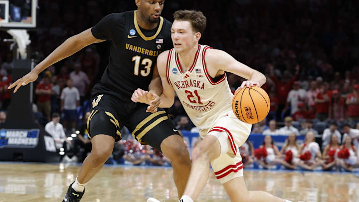 Pryce Sandfort drives to the hoop past Vanderbilt's Jalen Washington during the Huskers' win to advance to the Sweet Sixteen.
