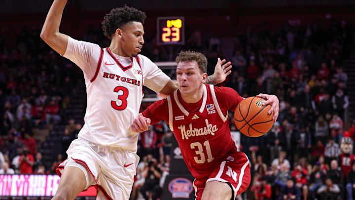 Nebraska guard Cale Jacobsen drives to the basket against Rutgers  guard Kaden Powers.