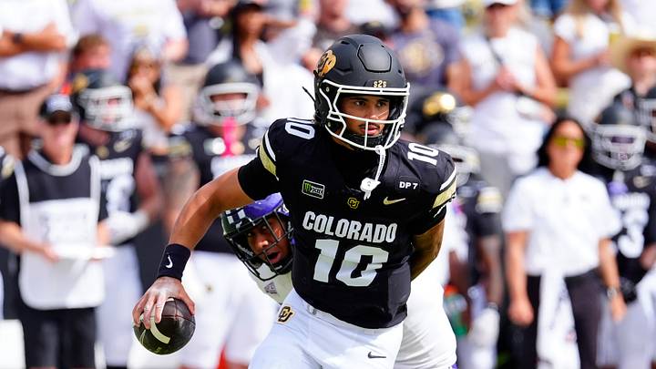 Sep 12, 2026; Boulder, Colorado, USA; Colorado Buffaloes quarterback Julian Lewis (10) scrambles in the first quarter against the Weber State Wildcats at Folsom Field. Mandatory Credit: Ron Chenoy-Imagn Images Sep 12, 2026; Boulder, Colorado, USA; Colorado Buffaloes quarterback Julian Lewis (10) scrambles in the first quarter against the Weber State Wildcats at Folsom Field. Mandatory Credit: Ron Chenoy-Imagn Images