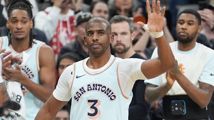 Dec 8, 2024; San Antonio, Texas, USA;  San Antonio Spurs guard Chris Paul (3) is recognized after moving into second place on the all-time assist leaders list in the first half against the New Orleans Pelicans at Frost Bank Center. Mandatory Credit: Daniel Dunn-Imagn Images