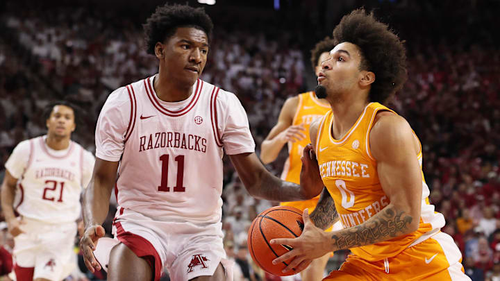 Tennessee Volunteers guard Jacobi Gillespie (0) drives to the basket against Arkansas Razorbacks wing Karter Knox (11) during the first half at Bud Walton Arena in Fayetteville, Ark. Tennessee Volunteers guard Jacobi Gillespie (0) drives to the basket against Arkansas Razorbacks wing Karter Knox (11) during the first half at Bud Walton Arena in Fayetteville, Ark.