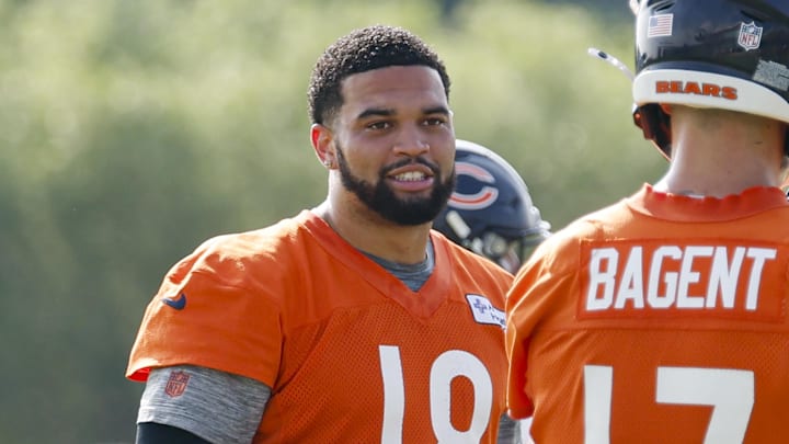 Jul 23, 2025; Lake Forest, IL, USA; Chicago Bears quarterback Caleb Williams (18) chats with quarterback Tyson Bagent (17) during training camp at Halas Hall. Mandatory Credit: Kamil Krzaczynski-Imagn Images