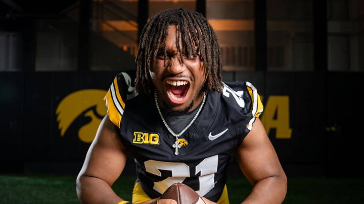 Iowa running back L.J. Phillips Jr. (21) stands for a portrait during Hawkeye football media day, Friday, Aug. 14, 2026, in Iowa City.