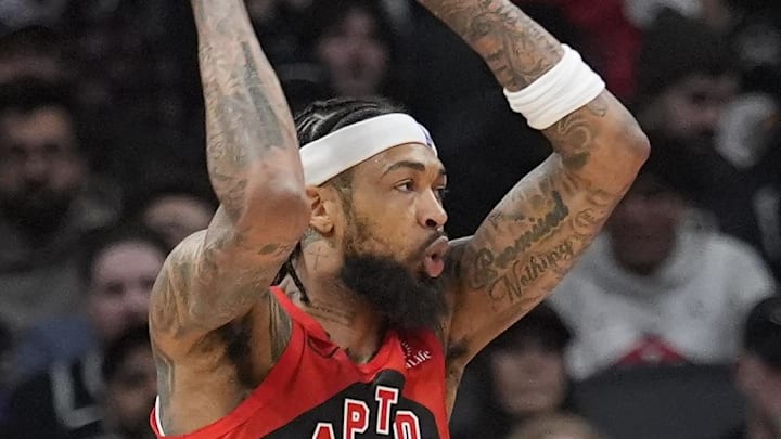Toronto Raptors forward Brandon Ingram goes to pass the ball against Detroit Pistons forward Tobias Harris.