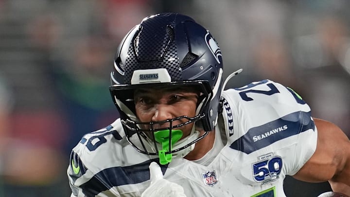 Seattle Seahawks running back Zach Charbonnet rushes the ball against the San Francisco 49ers.