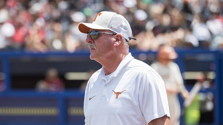 Texas Longhorns head coach Mike White looks across the field in the first inning against the Oklahoma Sooners. Texas Longhorns head coach Mike White looks across the field in the first inning against the Oklahoma Sooners.