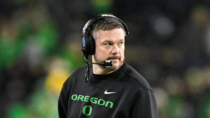 Dec 20, 2025; Eugene, OR, USA; Oregon Ducks head coach Dan Lanning looks on during the fourth quarter against the James Madison Dukes at Autzen Stadium. Mandatory Credit: Craig Strobeck-Imagn Images Dec 20, 2025; Eugene, OR, USA; Oregon Ducks head coach Dan Lanning looks on during the fourth quarter against the James Madison Dukes at Autzen Stadium. Mandatory Credit: Craig Strobeck-Imagn Images