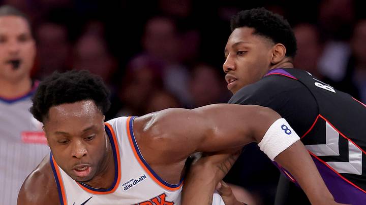 New York Knicks forward OG Anunoby controls the ball against Toronto Raptors guard RJ Barrett. New York Knicks forward OG Anunoby controls the ball against Toronto Raptors guard RJ Barrett.
