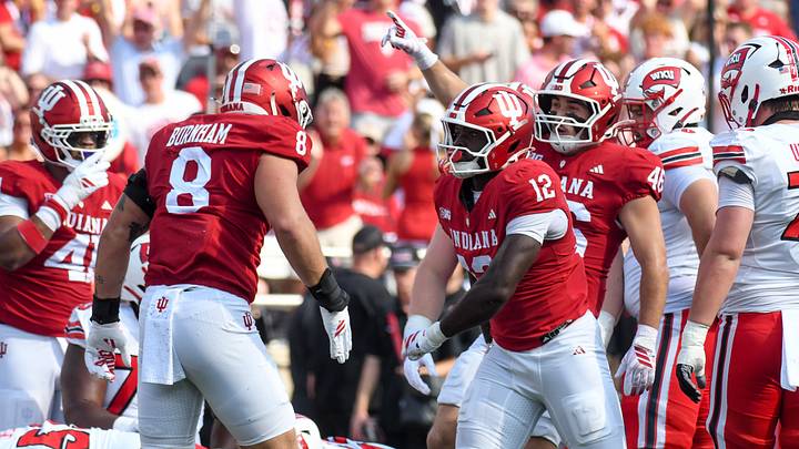 Sep 19, 2026; Bloomington, Indiana, USA; Indiana Hoosiers defensive lineman Tobi Osunsanmi (12) celebrates after a sack against the Western Kentucky Hilltoppers during the first half at Merchants Bank Field at Memorial Stadium. Mandatory Credit: Robert Goddin-Imagn Images Sep 19, 2026; Bloomington, Indiana, USA; Indiana Hoosiers defensive lineman Tobi Osunsanmi (12) celebrates after a sack against the Western Kentucky Hilltoppers during the first half at Merchants Bank Field at Memorial Stadium. Mandatory Credit: Robert Goddin-Imagn Images