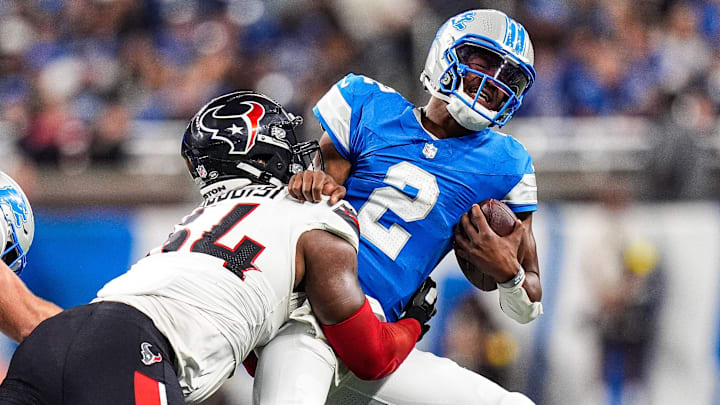 Detroit Lions quarterback Hendon Hooker (2) is sacked by Houston Texans defensive tackle Haggai Ndubuisi (64) during the second half at Ford Field in Detroit on Saturday, August 23, 2025. Detroit Lions quarterback Hendon Hooker (2) is sacked by Houston Texans defensive tackle Haggai Ndubuisi (64) during the second half at Ford Field in Detroit on Saturday, August 23, 2025.