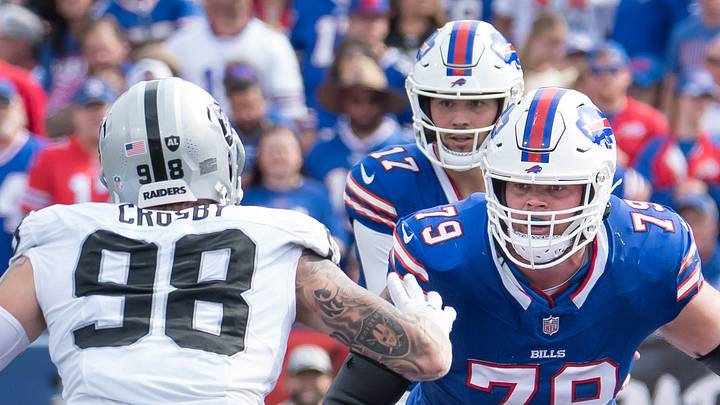 Sep 17, 2023; Orchard Park, New York, USA; Buffalo Bills offensive tackle Spencer Brown (79) prepares to block Las Vegas Raiders defensive end Maxx Crosby (98) to protect quarterback Josh Allen (17) in the fourth quarter at Highmark Stadium. Mandatory Credit: Mark Konezny-USA TODAY Sports