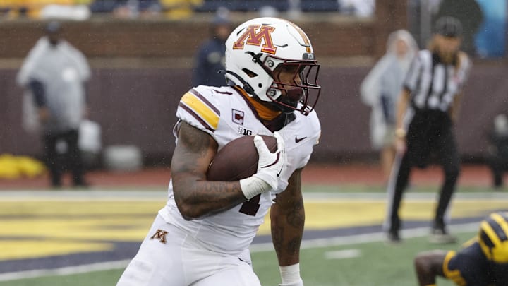 Sep 28, 2024; Ann Arbor, Michigan, USA; Minnesota Golden Gophers running back Darius Taylor (1) rushes in the first half against the Michigan Wolverines at Michigan Stadium. Mandatory Credit: Rick Osentoski-Imagn Images Sep 28, 2024; Ann Arbor, Michigan, USA; Minnesota Golden Gophers running back Darius Taylor (1) rushes in the first half against the Michigan Wolverines at Michigan Stadium. Mandatory Credit: Rick Osentoski-Imagn Images
