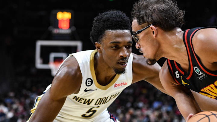 Nov 5, 2022; Atlanta, Georgia, USA; New Orleans Pelicans forward Herb Jones (5) pressures Atlanta Hawks guard Trae Young (11) in the third quarter at State Farm Arena. Mandatory Credit: Larry Robinson-Imagn Images
